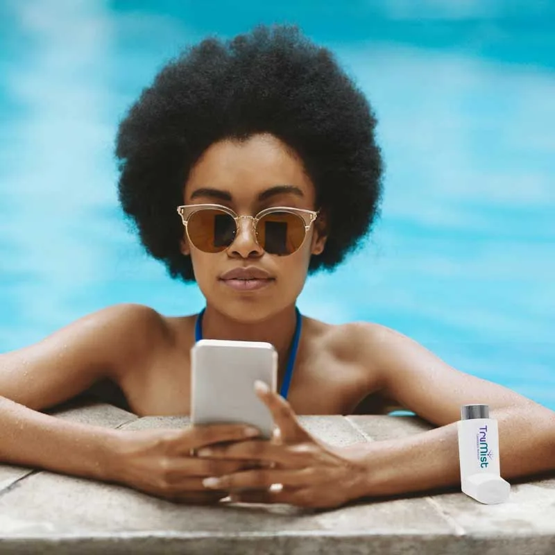 | TruMist Cannabis THC Inhaler nhalience safe thc inhaler: woman by pool